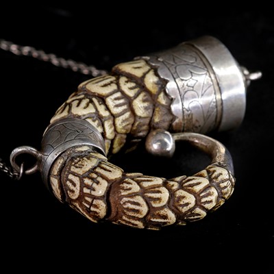 Lot 16 - A Spanish colonial armadillo tail shot flask