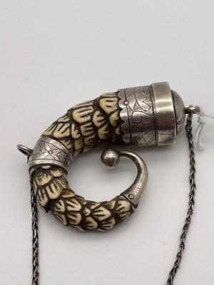 Lot 16 - A Spanish colonial armadillo tail shot flask