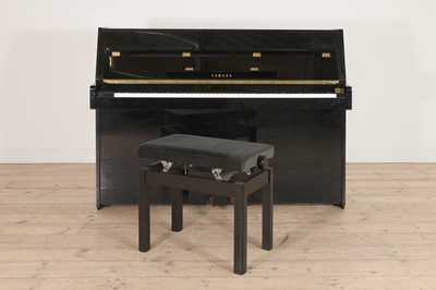 Lot 431 - A modern Yamaha 'E108' piano and stool