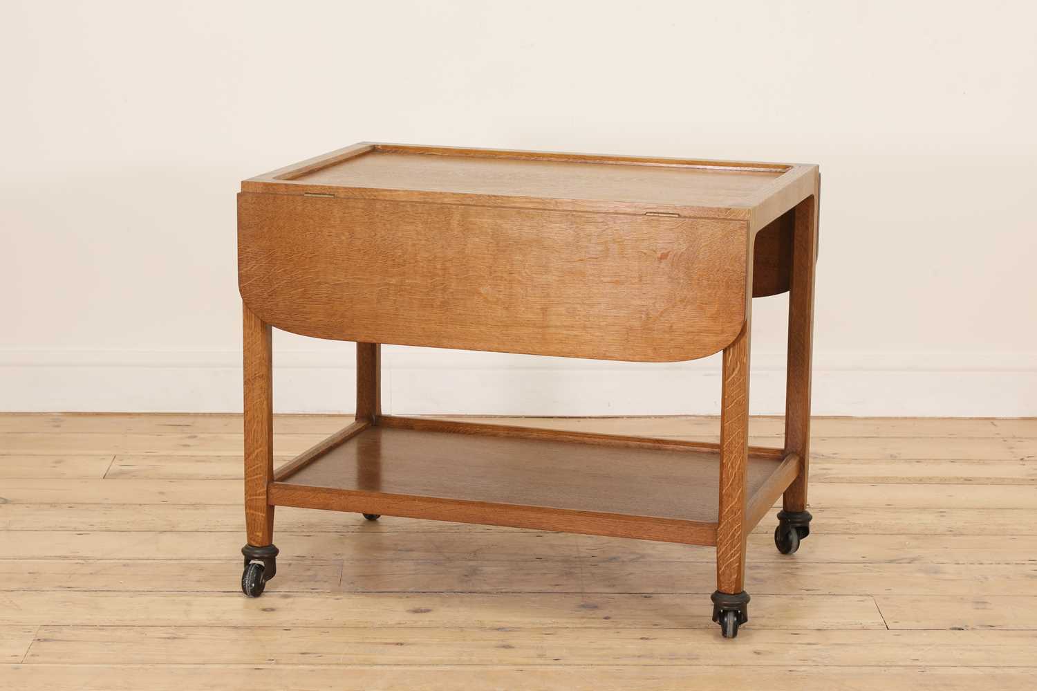 Lot 128 - A Lakes School oak trolley