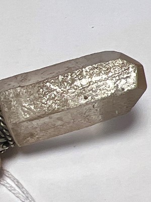 Lot 23 - A rock crystal finger or 'charivari'