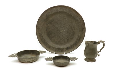 Lot 312 - A collection of pewter items