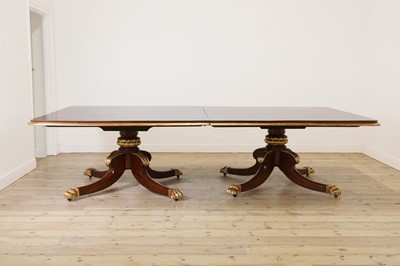 Lot 70 - A George IV mahogany and parcel-gilt dining table