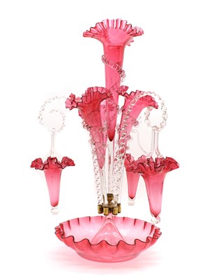 Lot 304 - A Victorian cranberry glass epergne