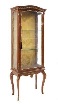 Lot 429 - A Louis XV style stained beech and parcel gilt vitrine