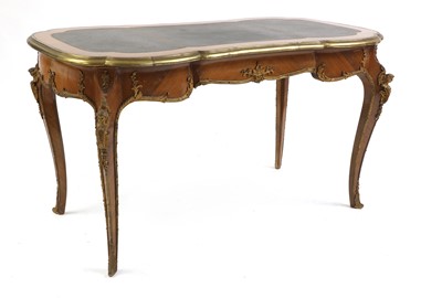Lot 425 - A Louis XV style kingwood and gilt metal-mounted bureau plat