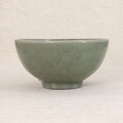 Lot 16 - A Chinese celadon bowl