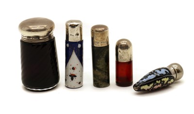 Lot 58 - A collection of silver topped scent bottles