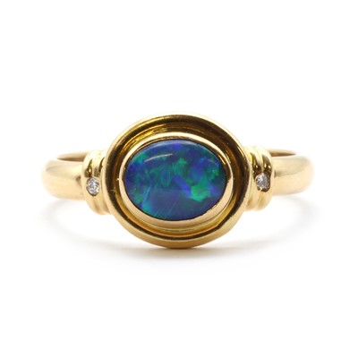 Lot 218 - A gold opal and diamond ring