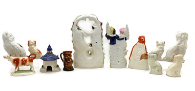 Lot 242 - A collection of Staffordshire figures