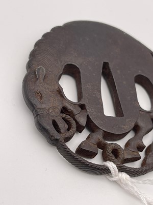 Lot 130 - An iron tsuba