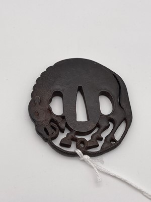 Lot 130 - An iron tsuba