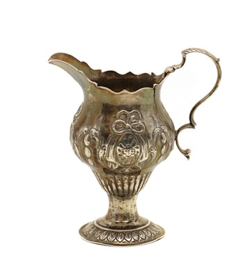 Lot 3 - A George III silver cream jug