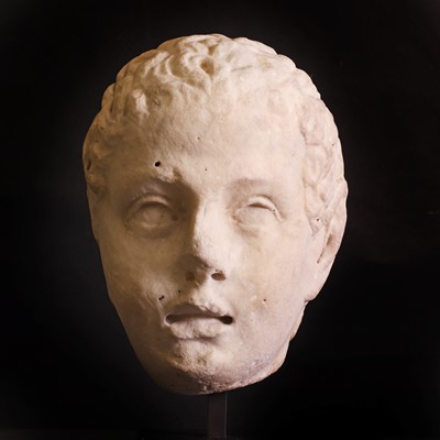Lot 203 - A Roman marble head of a young Satyr