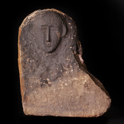 Lot 206 - A carved limestone Celtic votive head
