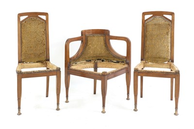 Lot 38 - A pair of Austrian secessionist mahogany side chairs and a corner chair