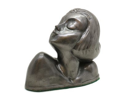 Lot 263 - A pewter bust of a girl