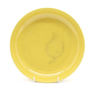 Lot 159 - A Chinese yellow glazed plate