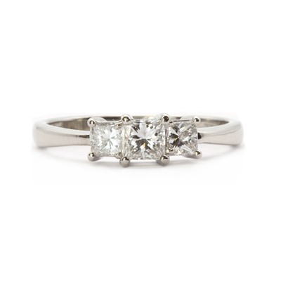 Lot 91 - A platinum three stone princess cut diamond ring
