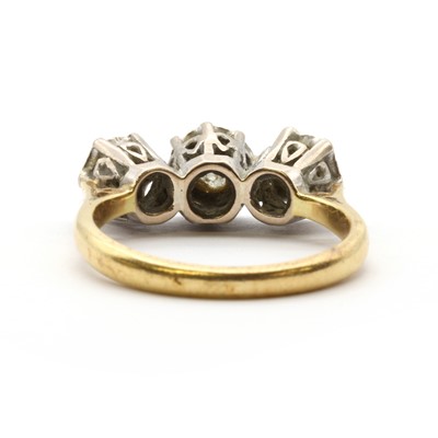 Lot 65 - An 18ct gold three stone diamond ring