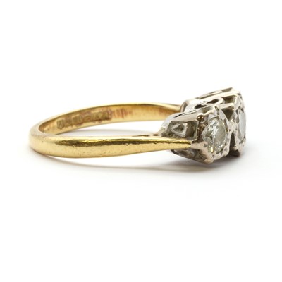 Lot 65 - An 18ct gold three stone diamond ring