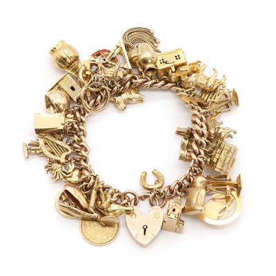 Lot 272 - A gold charm bracelet