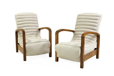 Lot 162 - A pair of Art Deco oak lounge chairs