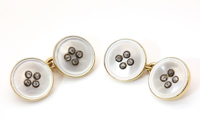 Lot 124 - A pair of diamond and mother of pearl button style chain link cufflinks, c.1930