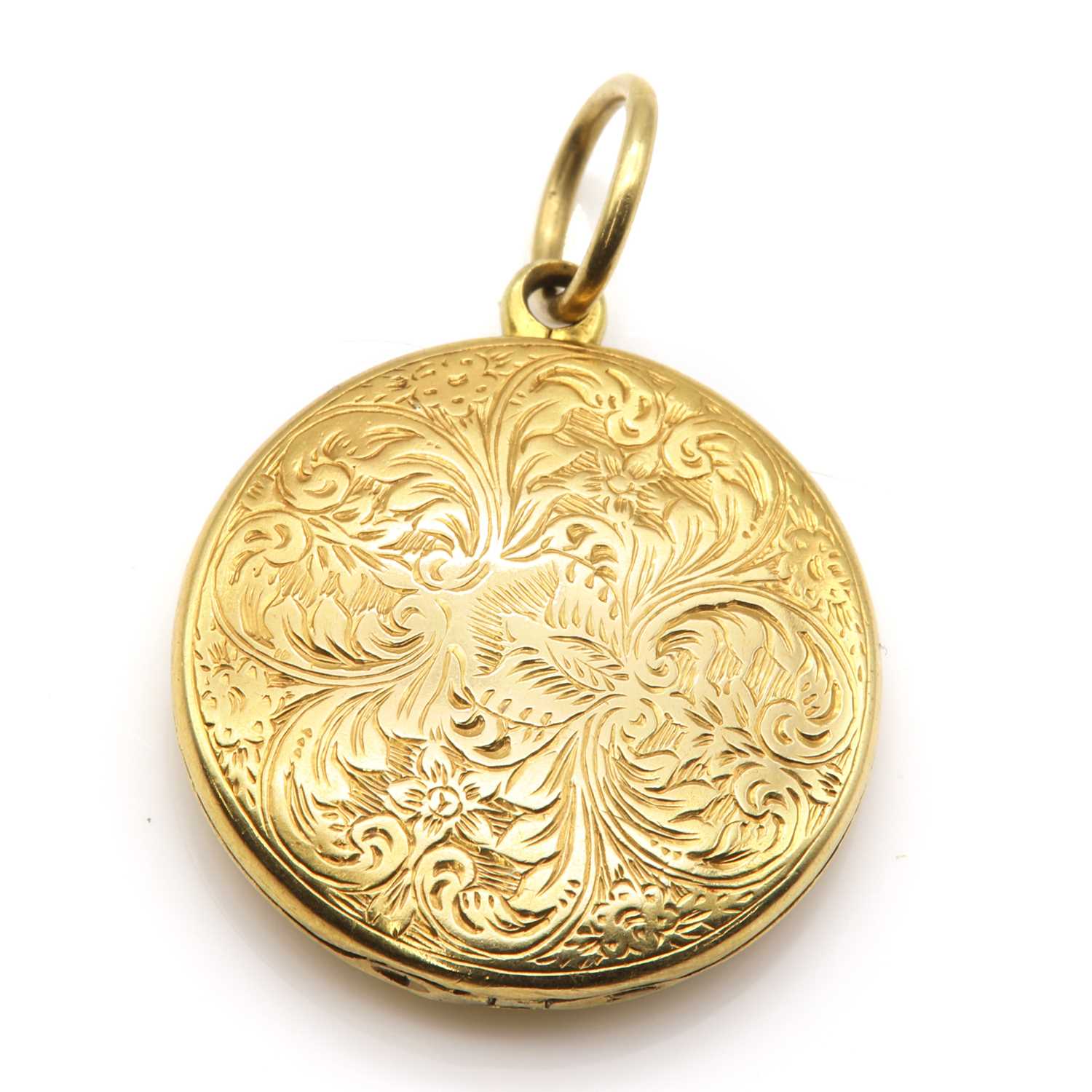 Lot 42 - A circular hinged locket form vinaigrette,