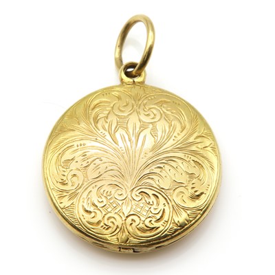 Lot 42 - A circular hinged locket form vinaigrette