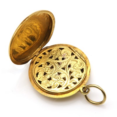 Lot 42 - A circular hinged locket form vinaigrette
