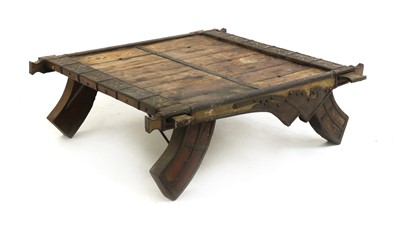 Lot 406 - A teak and wrought iron mounted elephant table
