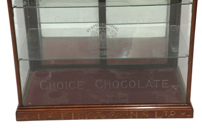 Lot 373 - A Fry’s Chocolate walnut display cabinet