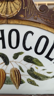 Lot 373 - A Fry’s Chocolate walnut display cabinet