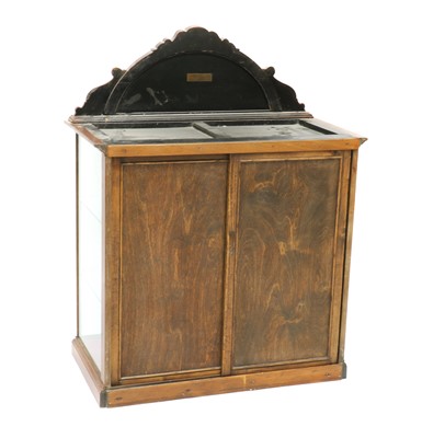 Lot 373 - A Fry’s Chocolate walnut display cabinet