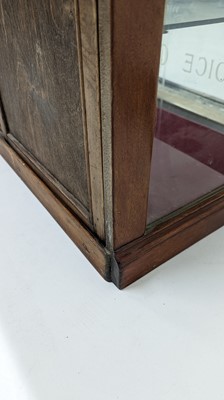 Lot 373 - A Fry’s Chocolate walnut display cabinet