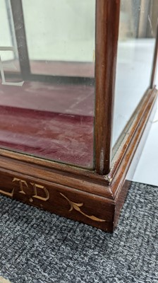 Lot 373 - A Fry’s Chocolate walnut display cabinet