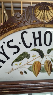 Lot 373 - A Fry’s Chocolate walnut display cabinet