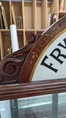 Lot 373 - A Fry’s Chocolate walnut display cabinet