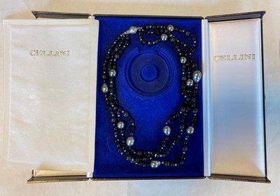 Lot 231 - A three row onyx and cultured Tahitian pearl necklace, by Cellini