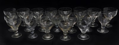 Lot 169 - A collection of twenty George IV glass rummers