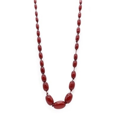 Lot 27 - A single row graduated cherry coloured Bakelite bead necklace