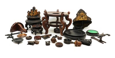 Lot 103 - A group of hardwood oriental stands and lacquered brackets