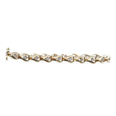 Lot 68 - A gold diamond bracelet
