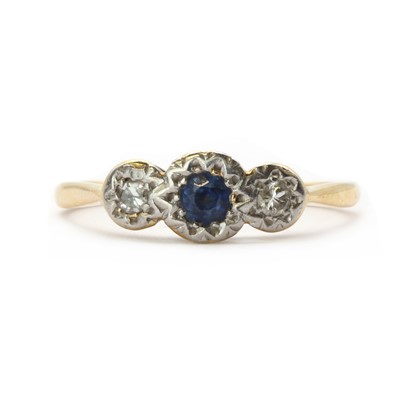 Lot 183 - A gold sapphire and diamond three stone ring