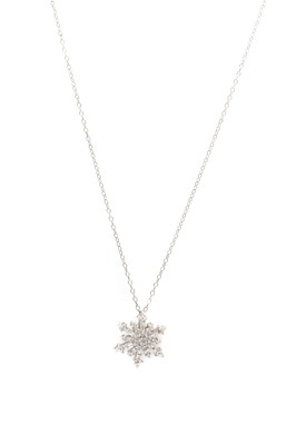 Lot 1174 - A 9ct white gold diamond snowflake pendant