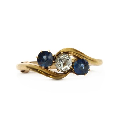 Lot 14 - An Edwardian 18ct gold diamond and sapphire three stone ring