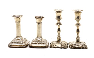 Lot 129 - A pair of Victorian silver candlesticks