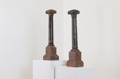 Lot 8 - A pair of marble candlesticks