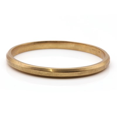 Lot 79 - An Art Deco 9ct gold hollow upper arm bangle, by Henry Griffith & Sons